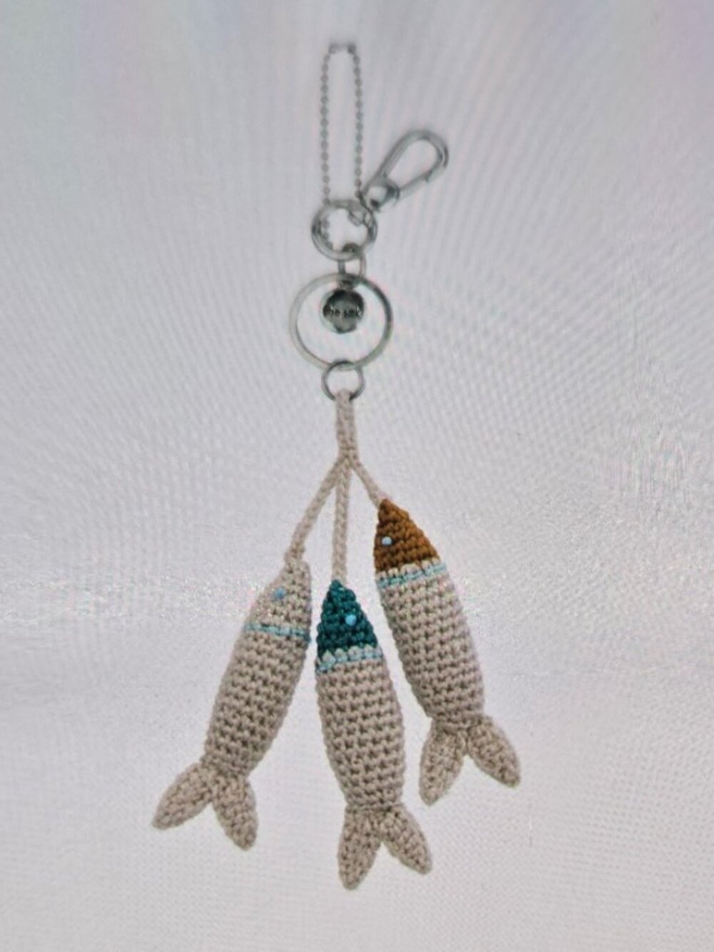 The Sak Yarnicharmz Dangle Sardines
